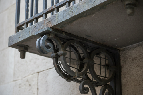 Bracket bearing plate and scrollwork detail